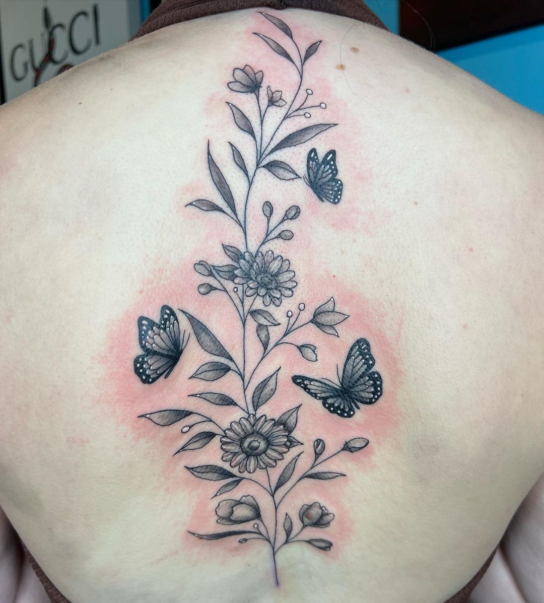 a close up of a tattoo on his head