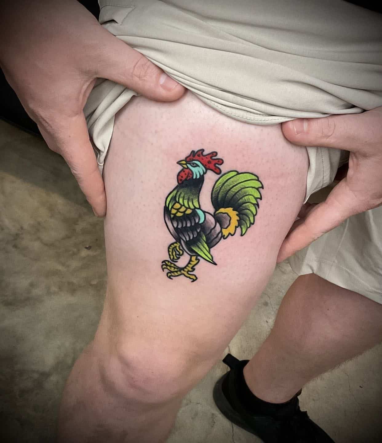 a person holding a tattoo