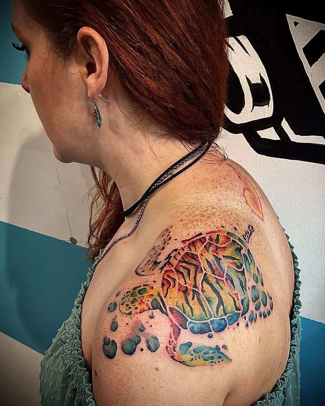 a tattoo on their face