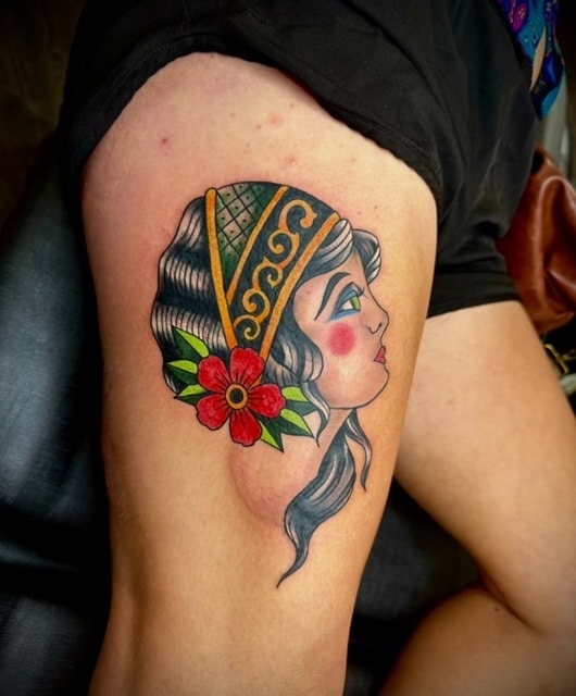 a tattoo of a woman
