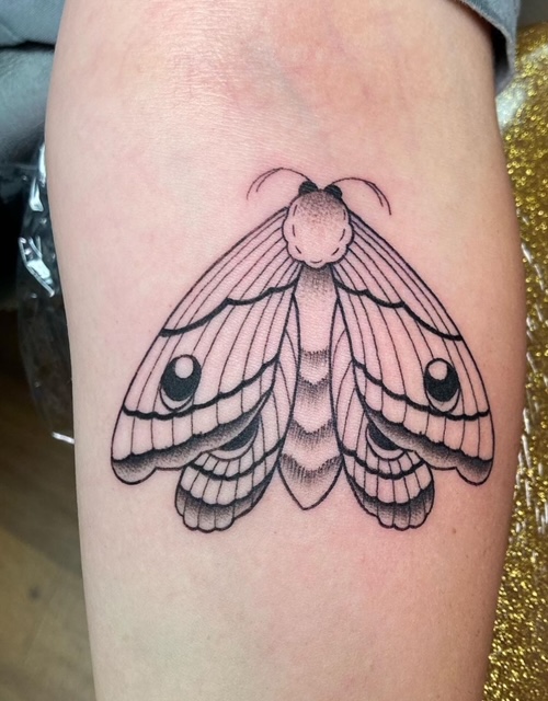 Hannah Sheridan at work in Southernmost Tattoo, a leading tattoo and piercing studio in Key West.
