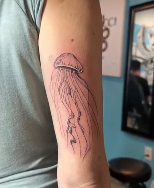 a tattoo on his arm