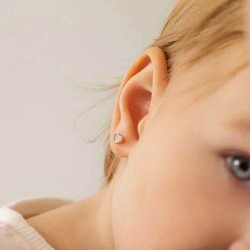 Ear piercing at Southernmost Tattoo, top-rated piercing studio in Key West, Florida for kids