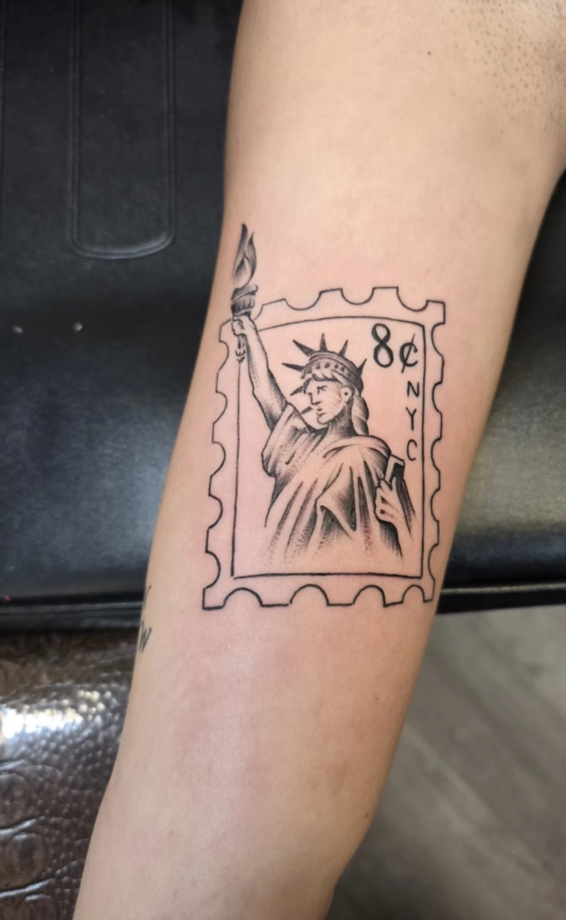 James Hiber creating detailed artwork at Southernmost Tattoo, a must-visit Key West tattoo parlor
