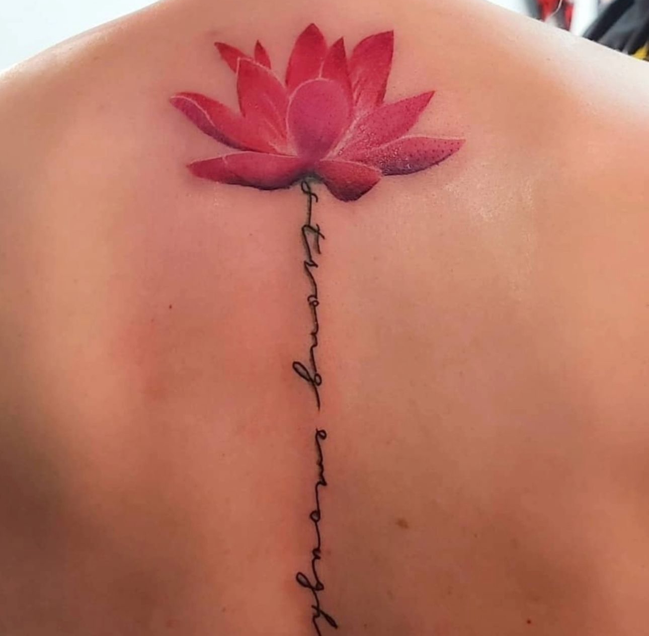 a tattoo on his head