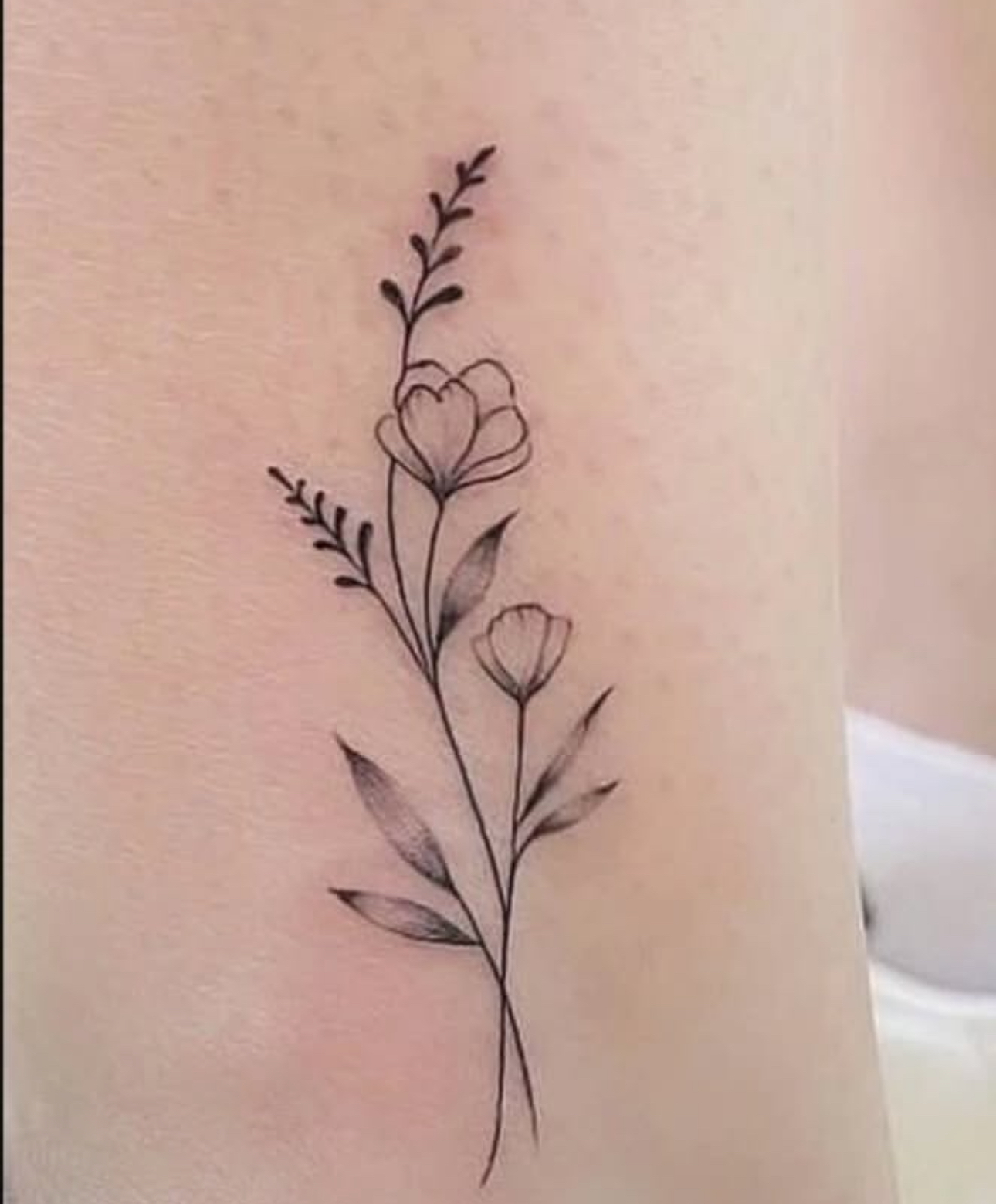 a tattoo on his arm