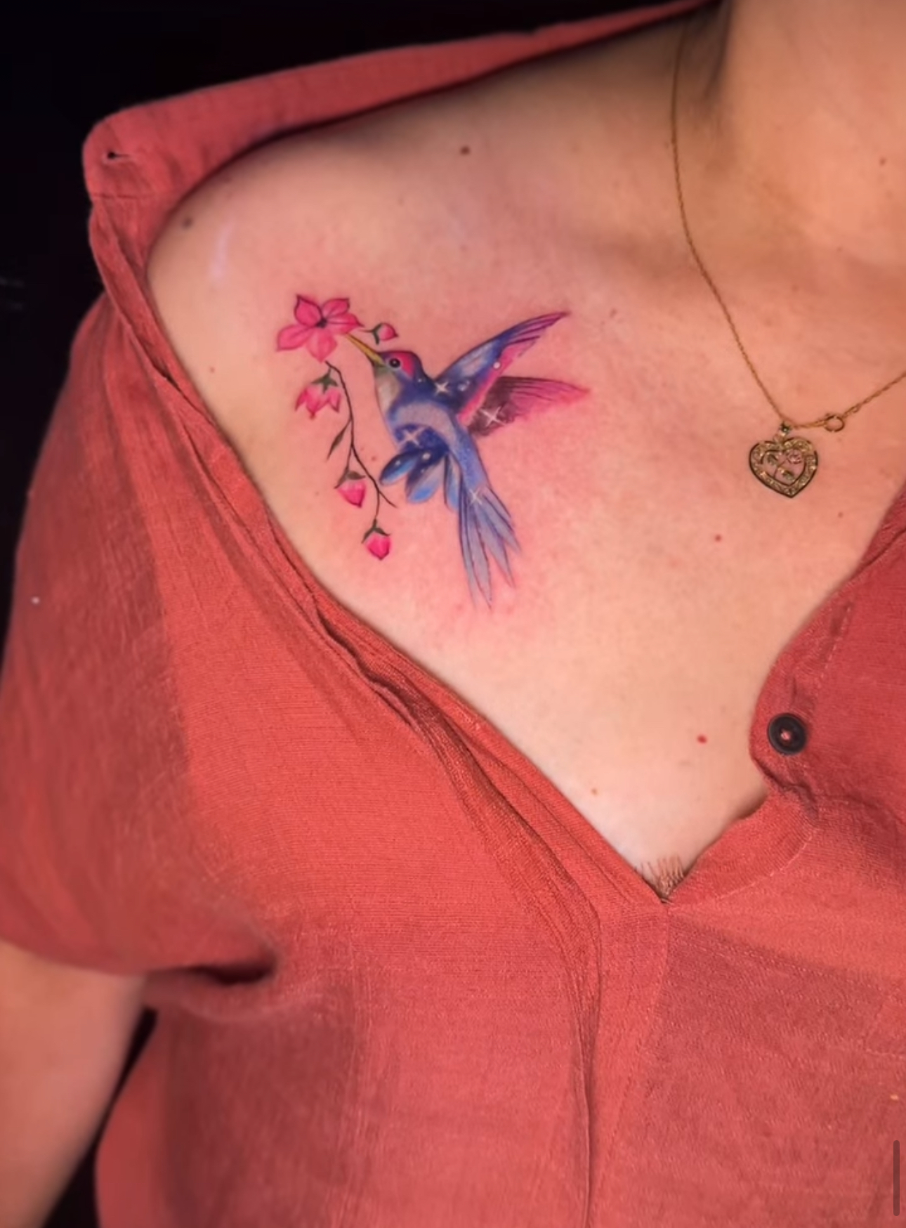 a woman wearing a tattoo on her head