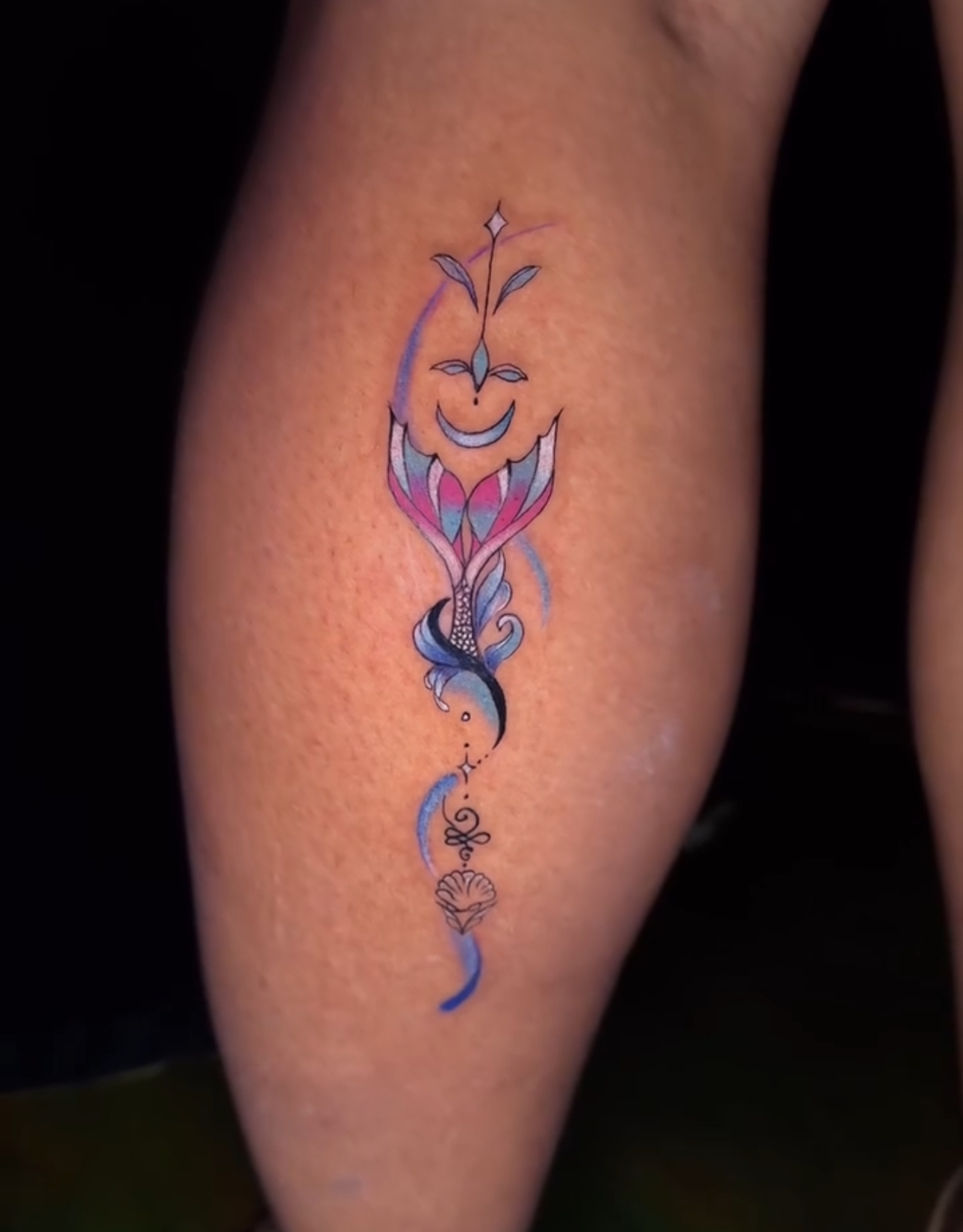 a tattoo on their face