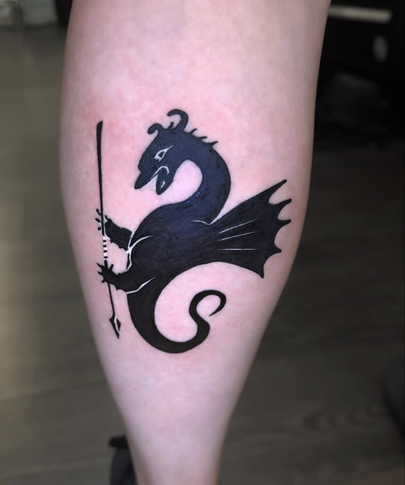 a tattoo on their face